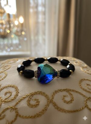 Pulsera de Cuentas Negras Facetadas con Corazón Iridiscente Azul-Verde